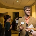 Two men talk during the event